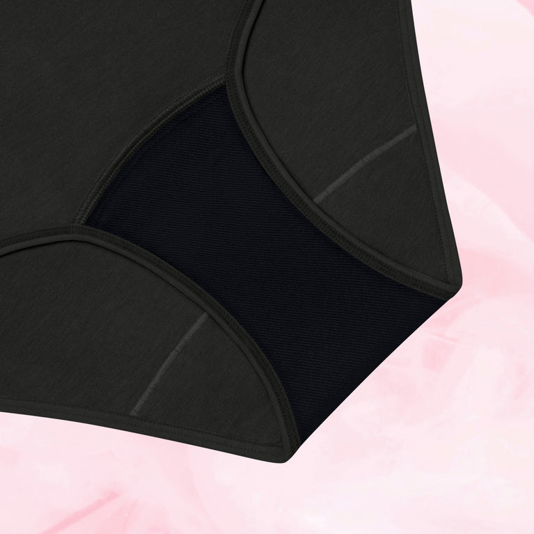 Teens Hipster Kraftigt Flow 5-pak menstruationstrusser detaljevisning.